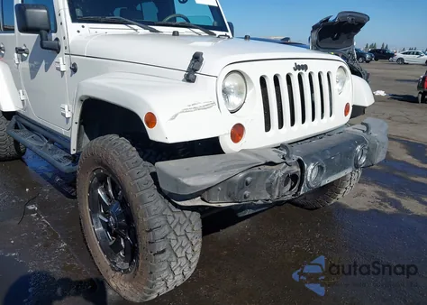 2010 Jeep Wrangler Unlimited Sahara from USA, damaged, VIN 1J4HA5H1XAL184402